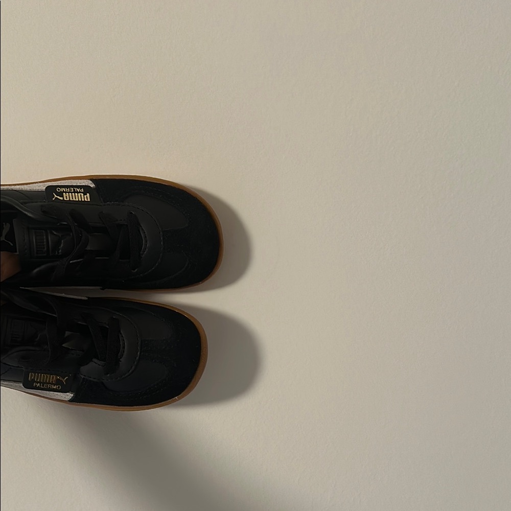 NWOT! Puma Black Sneakers with Sleek Design and Contrast Sole
